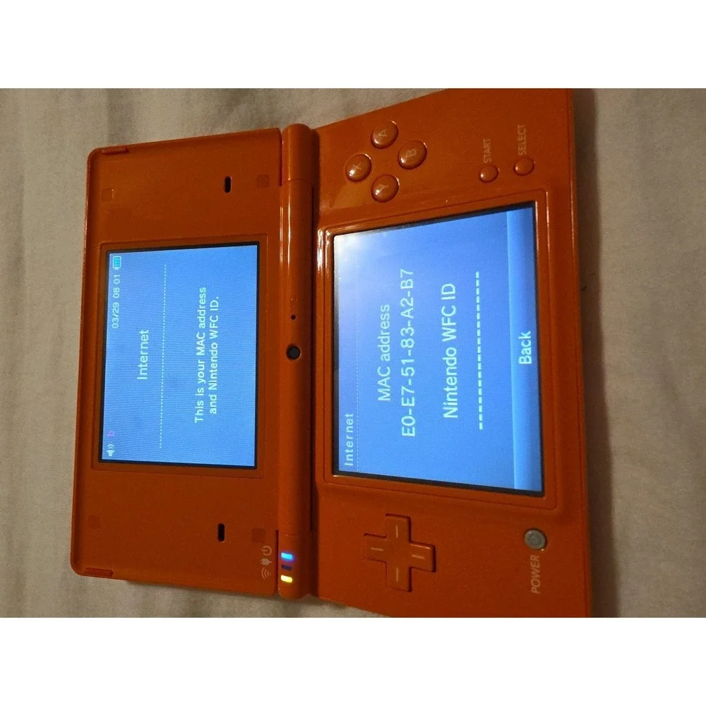 Nintendo DSi Orange handheld system Console